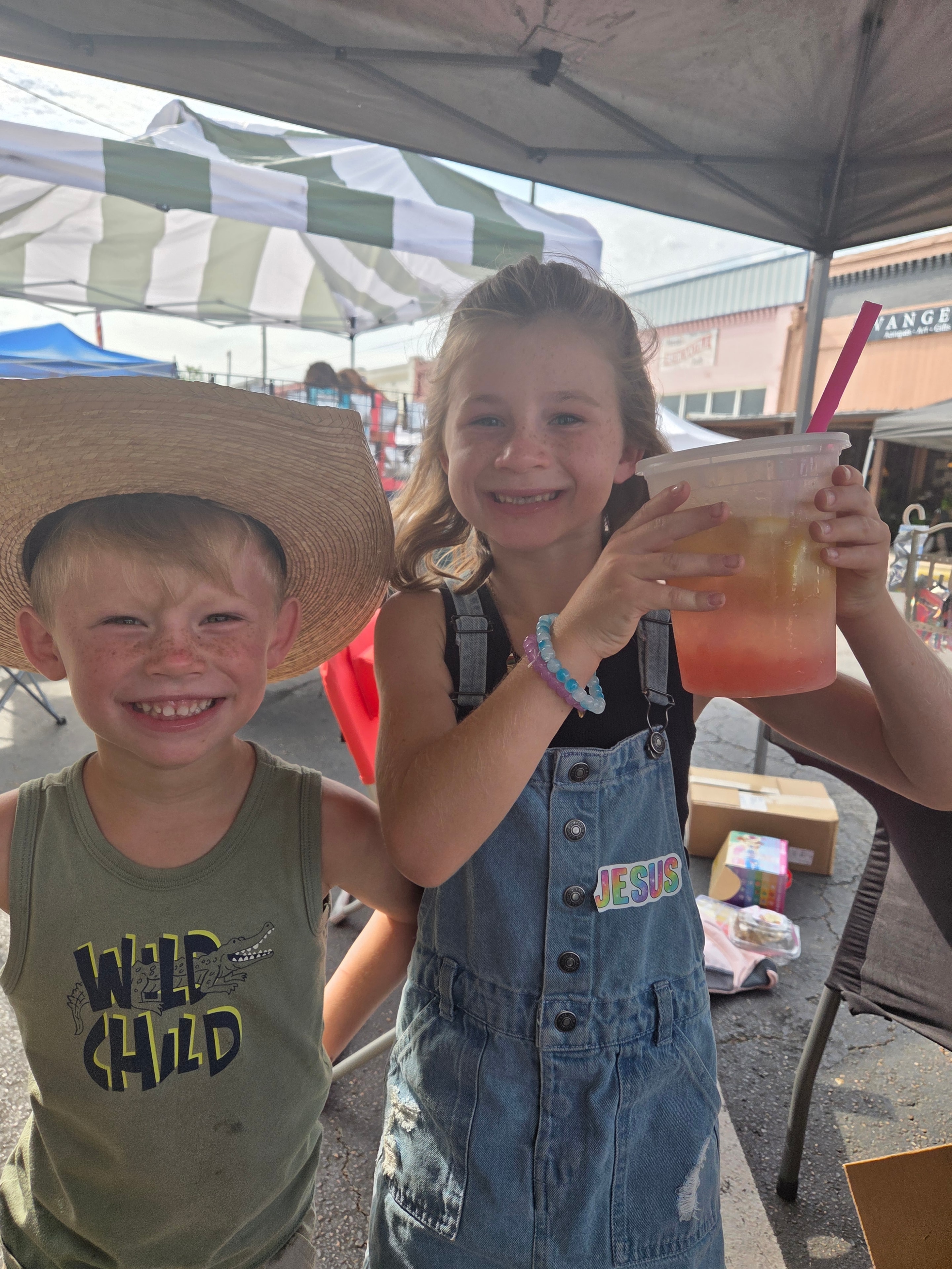 Kids at the market booth